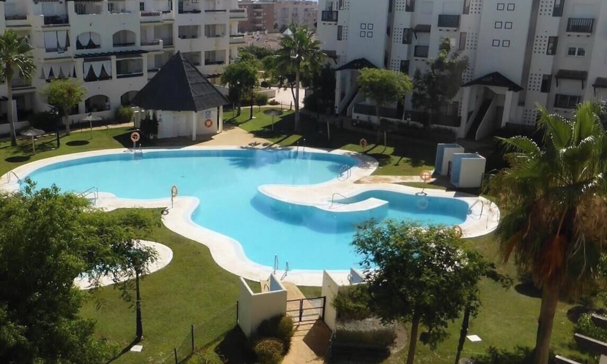San Luis de Sabinillas Apartment | Apartment 'Residencial Duquesa Fase I' with Terraces, Shared Pools & Wi-Fi