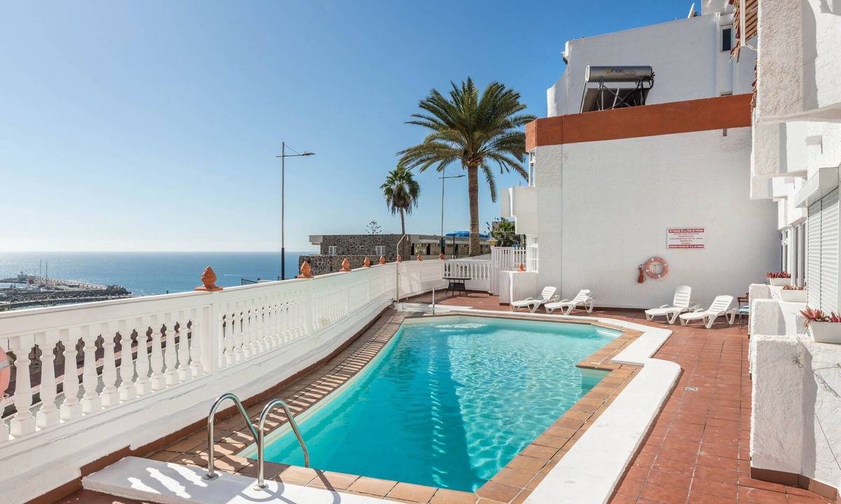 Puerto Rico Apartment | Holiday Apartment ‘Sweet Home’ with Air Conditioning, Terrace & Shared Pool