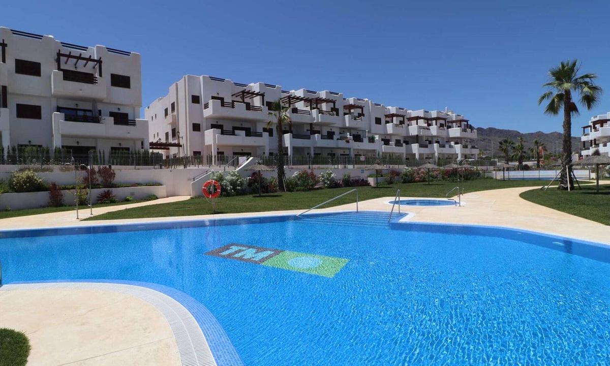 Mar de Pulpi Apartment | Modern apartment in San Juan de los Terreros with pool and air conditioning