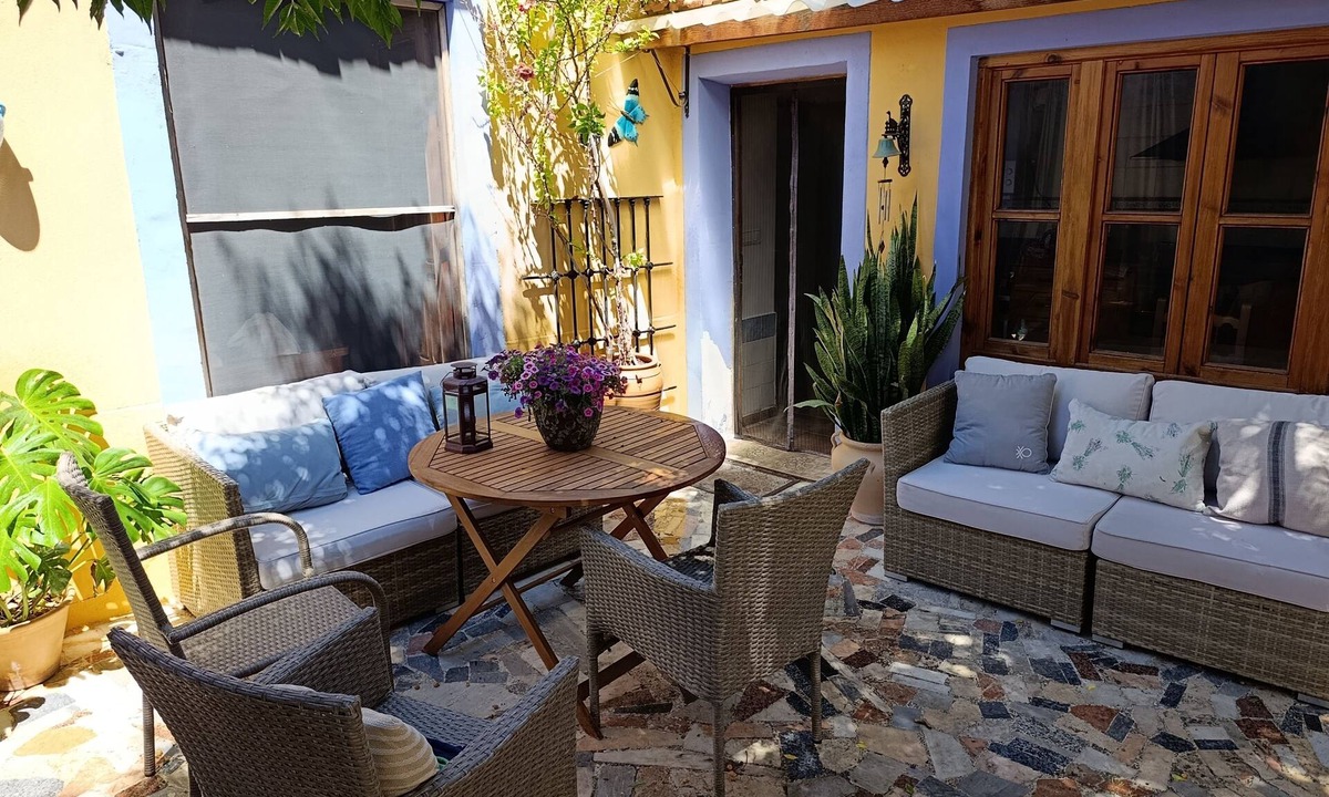 La Nora House | Room with pool and patio in a shared house
