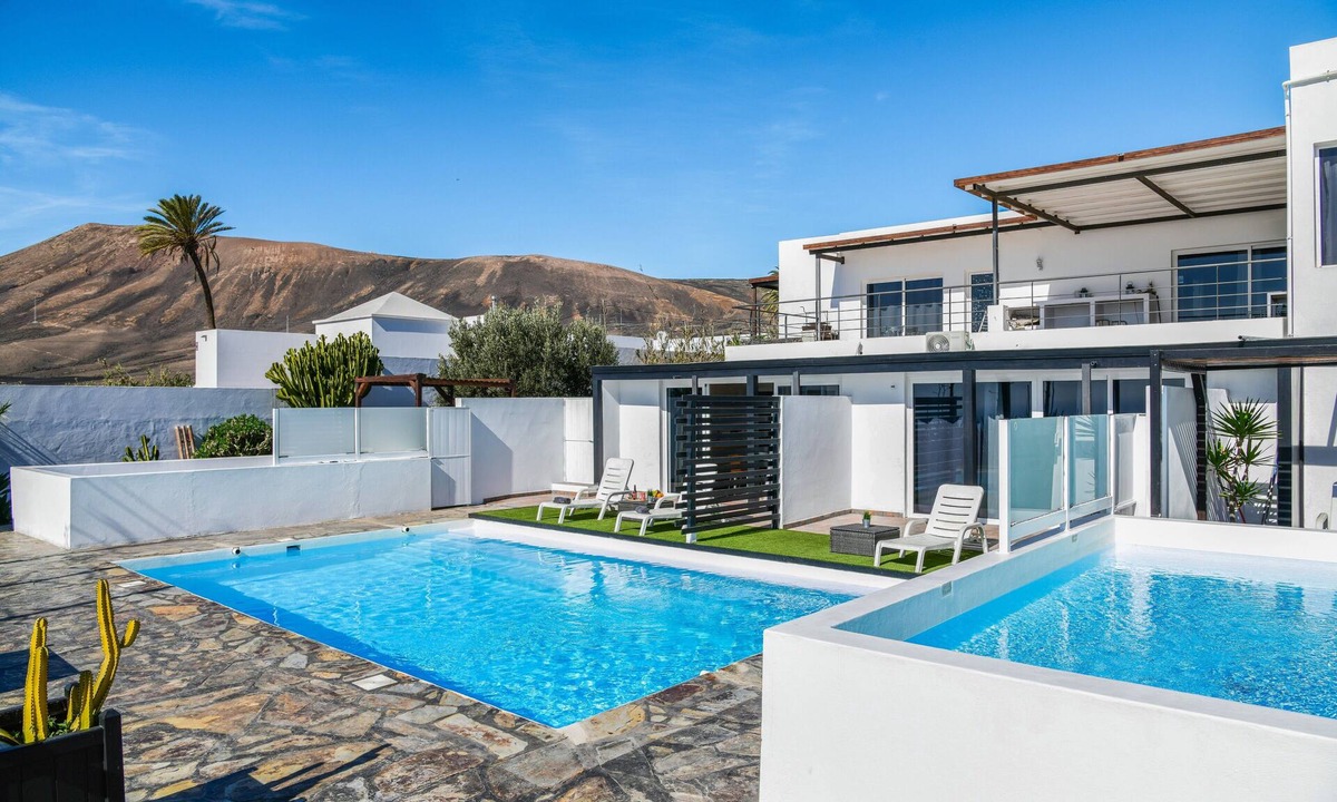 Macher House | Vacation Apartment "Casa Amanecer 3" with Sea & Mountain Views, Pool, and Terrace