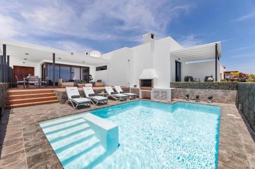 Macher Villa | Villa con piscina climatizada y vistas al mar