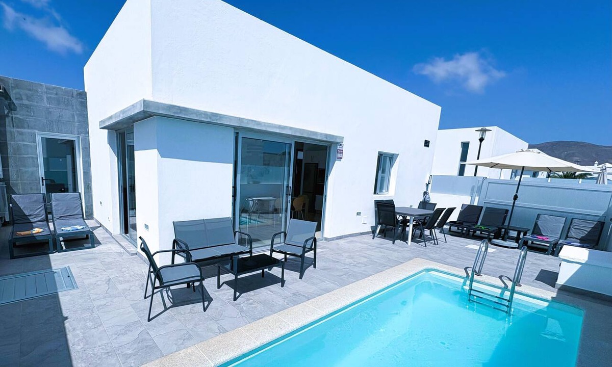 Playa Blanca Villa | Villa New York: Guaranteed 30°C Heated Pool, A/C, Fast WiFi & Premium TV