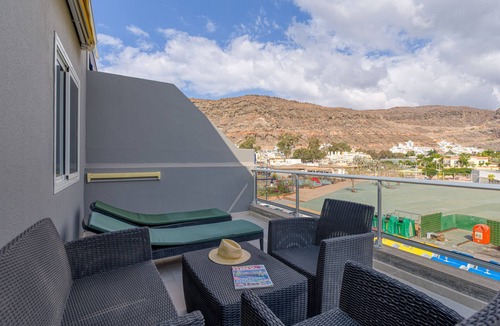 Playa de Mogan Apartment | 20 meters from the beach, private parking and AC