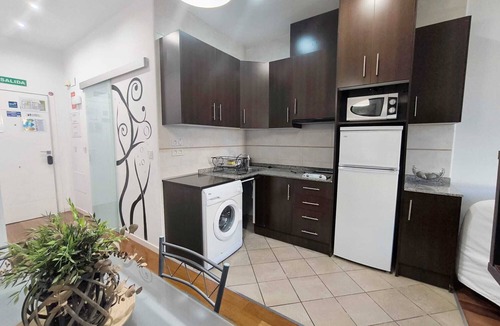 Barri Vell - Santa Creu Apartment | ABAD STUDIO with views of the Santa Barbara Castle, 5 minutes from the beach