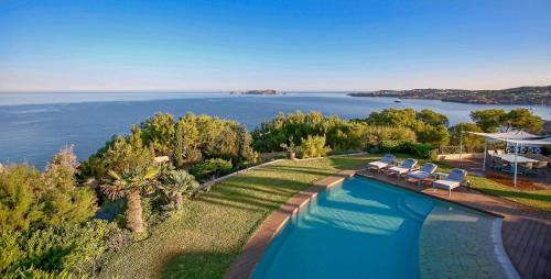 Sant Josep de sa Talaia Villa | Amazing Ibiza Villa Can Icarus 6 Bedrooms Perched On A Cliff Overlooking The Beach Of Cala Moli San Jose