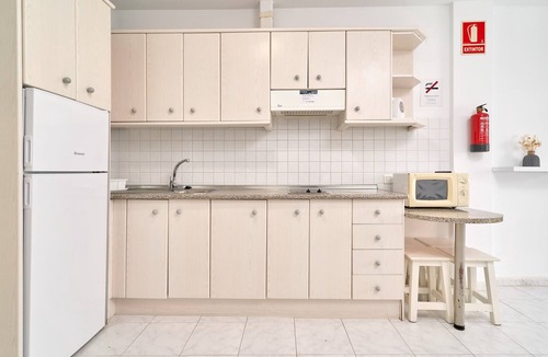Chimenea Apartment | Apartment in 'N9' Hotel with Shared Pool, Wi-Fi, and Air Conditioning