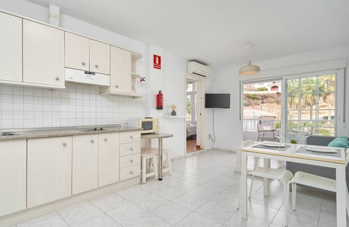 Chimenea Apartment | Apartment in 'N9' Hotel with Shared Pool, Wi-Fi, and Air Conditioning