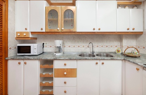 Torre de Benagalbon Apartment | Apartment 'Los Rubios Playa' with Private Terrace, Shared Garden and Wi-Fi