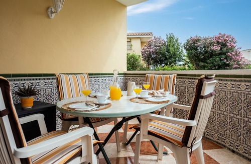 Torre de Benagalbon Apartment | Apartment 'Los Rubios Playa' with Private Terrace, Shared Garden and Wi-Fi