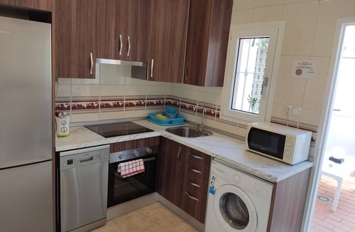 Islantilla Apartment | Apartment 'Mirador Del Golf' with Shared Pool, Private Terrace and Wi-Fi