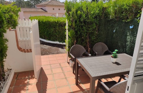 Islantilla Apartment | Apartment 'Mirador Del Golf' with Shared Pool, Private Terrace and Wi-Fi