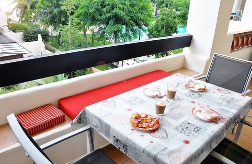 San Luis de Sabinillas Apartment | Apartment 'Residencial Duquesa Fase I' with Terraces, Shared Pools & Wi-Fi