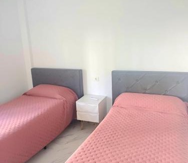 San Luis de Sabinillas Apartment | Beautiful Beachfront 2 BR Apt I Parking I 30 m to Beach I Swimming Pool I Walk to Duquesa I Close to Golf, I Fast Wifi