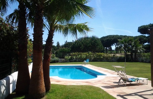 Nuevo Portil Villa | Beautiful villa , close to the beach . Secluded garden with private pool.