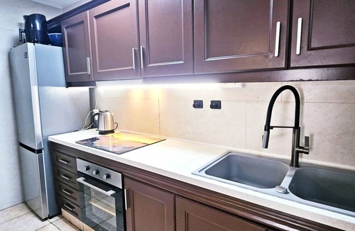 Santa Pola Villa | Bright duplex near the beach in Santa Pola – Terrace with side sea viewsCozy duplex apartment for 6 people, located in a quiet residential area, just a few steps from the beach.On the ground floor, you'll find a living room decorated with a mural simul
