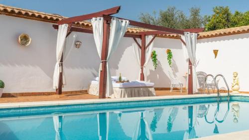 Penaflor Villa | Cortijo Los Mellizos Penaflor by Ruralidays