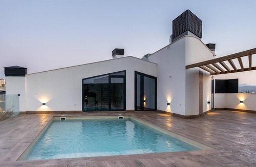 Santiago y Zaraiche Apartment | Design flat for 2 people with communal swimming pool and gym.
