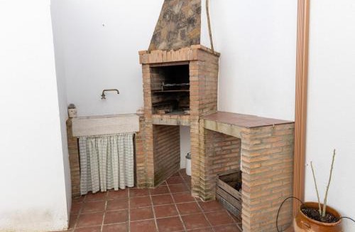 Dona Rama House | Encanto Rústico: Chimenea y Barbacoa Norte Córdoba