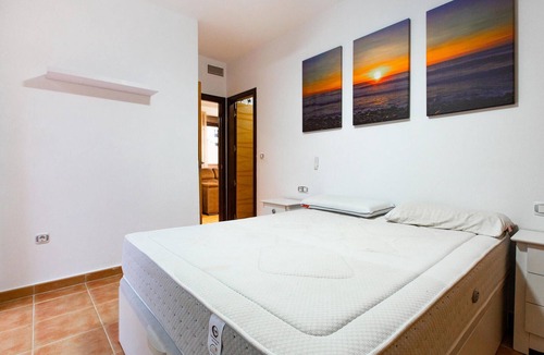 Los Geraeos Apartment | Enjoy a relaxing vacation in this terraced house with communal pool.