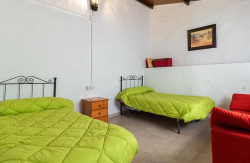 Cuevas de San Marcos House | Enjoy a unique view of the countryside in this inviting vacation home with pool.