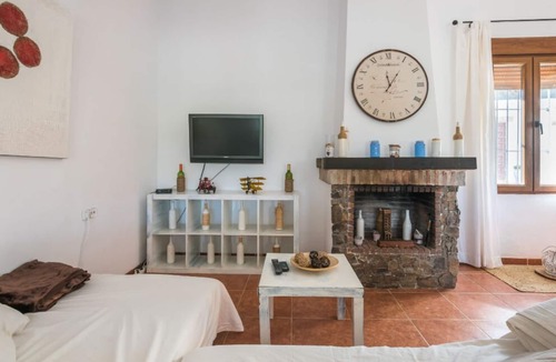 Casabermeja Other | Finca Colors. It is a farm nestled in the natural landscape.