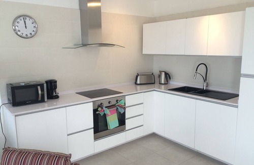 Puerto del Carmen Apartment | Front line, contemporary, stunning sea views, pool, WiFi, SKY