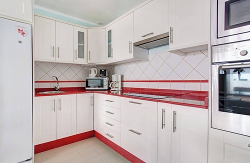 Playa Blanca Apartment | Holiday Apartment "Playa Flamingo 37" with Shared Pool, A/C & Wi-Fi