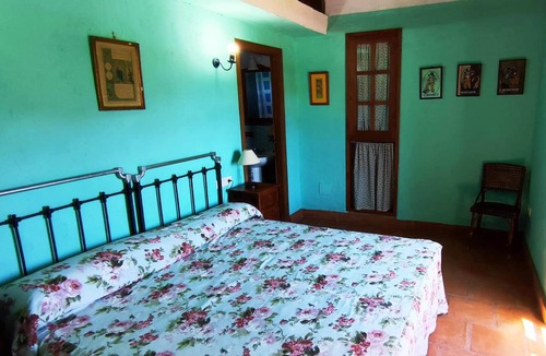 Zahara de la Sierra House | Homerez - House for 12 ppl. with shared pool and garden at Zahara de la Sierra