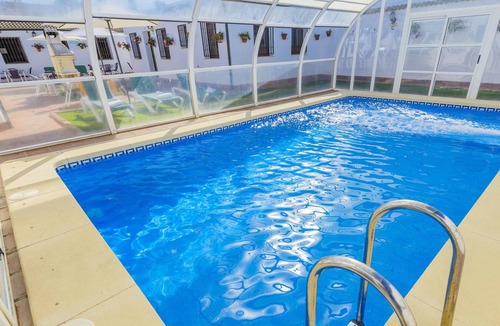 Rivero de Posadas Villa | Homerez - Villa for 20 ppl. with swimming-pool and terrace at Rivero de Posadas