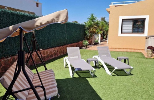 Caleta de Fuste Villa | Luxury 3 bedroom villa overlooking golf course with private pool and Wi-fi