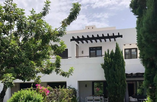 Playa Macenas Villa | Modern, 4 bedroom, 3 bathroom villa in Macenas with large communal pool