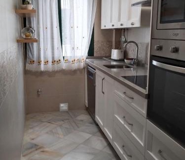 El Portil Apartment | Modern apartment with pool in the heart of El Portil