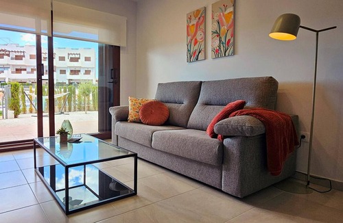 Mar de Pulpi Apartment | Modern apartment in San Juan de los Terreros with pool and air conditioning