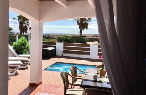Caleta de Fuste House | Modern villa on the golf course with stunning views, Wifi and heated pool