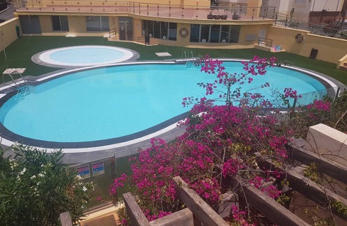 Caleta de Fuste Villa | Poolside villa with private access from terrace in secure gated community.