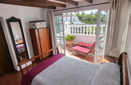 Oasis del Capistrano Apartment | Relax.south facing terrace, all day sun, views of tropical gardens and pools