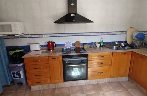 La Nora House | Room with pool and patio in a shared house