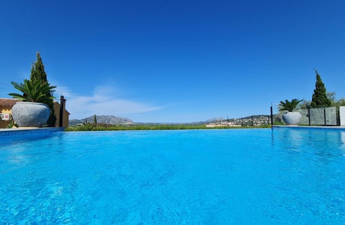 Orba House | Simply relax with a fantastic view of the valley, mountains and sea.