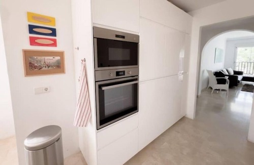 Benalmadena Apartment | Spacious family Home, sea view terrace, pool & 2 parking spaces