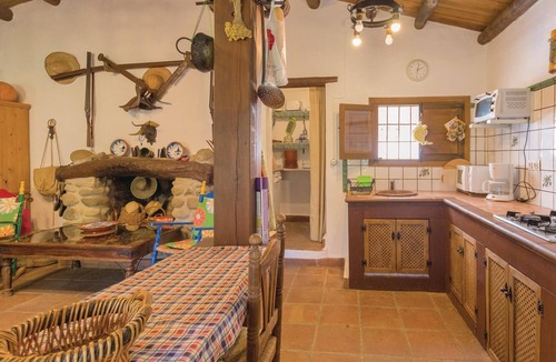 Totalan House | Surrounded by trees in a very private environment is this typical Andalusian house, renovated in the