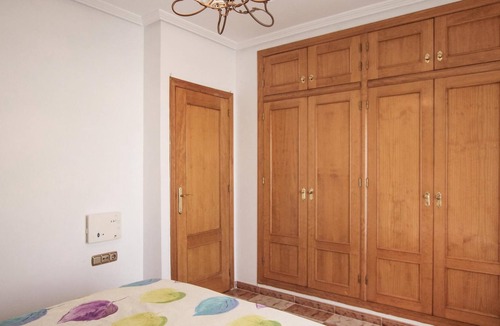 La Marina House | This beautiful vacation townhouse in La Marina, on the Costa Blanca, offers access to a communal poo