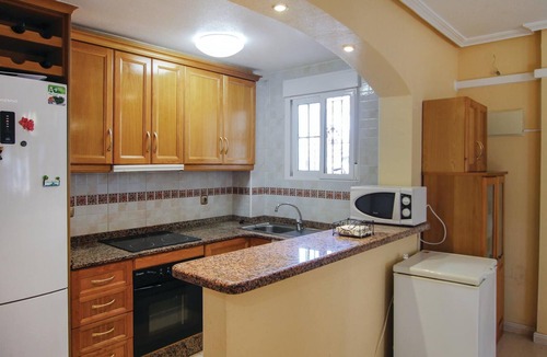 La Marina House | This beautiful vacation townhouse in La Marina on the Costa Blanca offers access to a communal pool