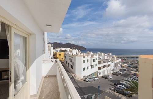 Gran Tarajal Apartment | Vacation Apartment 'Edificio El Baifo Loco - Milena' with Sea View and Balcony