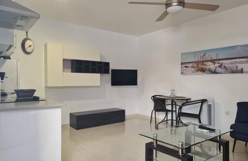 Playa de Arinaga Apartment | Vacation 'Casa Paula - 22' with Mountain View, Shared Pool and Wi-Fi