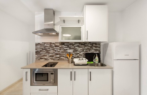 Playa de Arinaga Apartment | Vacation 'Casa Paula - 24' with Mountain View, Private Pool and Wi-Fi