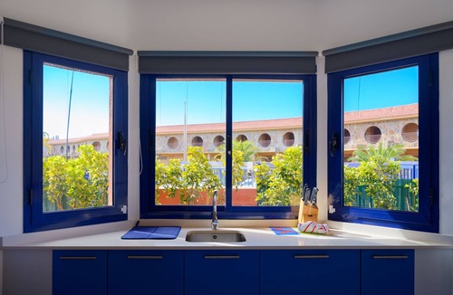 Costa Meloneras Villa | Villa Meloneras 21 beachside with BBQ, access to pool, jacuzzi & kids playground