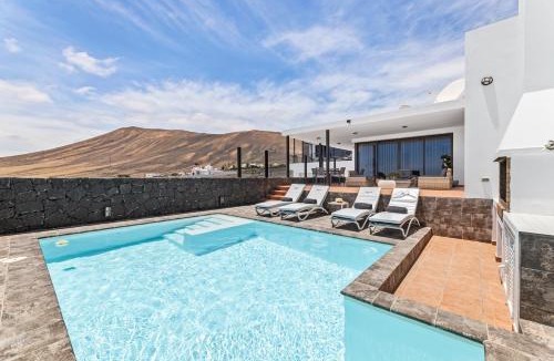 Macher Villa | Villa con piscina climatizada y vistas al mar