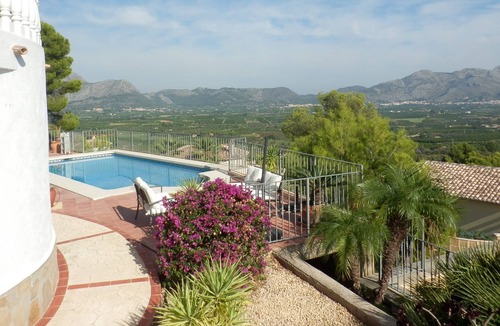 Ensanche Diputacion House | Villa Elizabeth is a private detached villa set in its own garden with a pool.