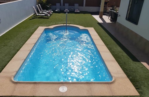 Castillo Caleta de Fuste Ski Chalet | Villa Thais with private heated pool in Caleta de Fuste.